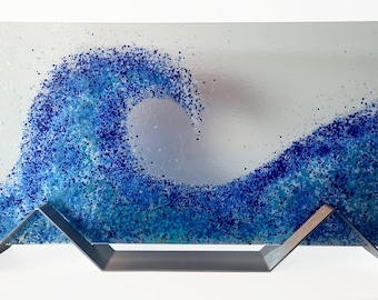 Interior decoration depicting a large wave of fused glass