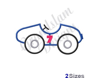 May include: Blue and black cartoon race car with a pink number 7 on the side. The car has two large wheels and a small steering wheel.