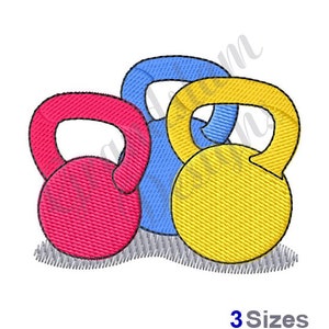May include: Three kettlebells in different colours: red, blue and yellow. The kettlebells are stacked on top of each other.