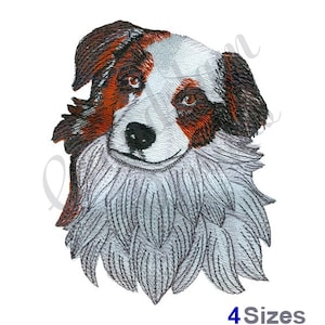 May include: Embroidered design of a brown, white, and black dog with a fluffy white beard. The dog is looking directly at the viewer with a friendly expression.