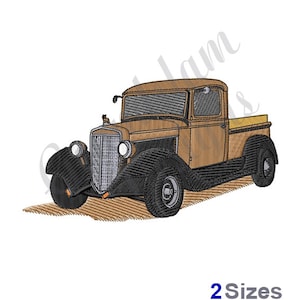 May include: A brown vintage pickup truck with a black grill and black wheels. The truck is on a brown dirt road.