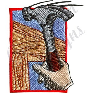 May include: Embroidered image of a hand holding a hammer, hammering a nail into a piece of wood. The wood is brown and the hammer is silver with a red handle. The background is blue and red.