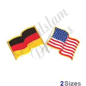 May include: Two flags crossed over each other. The flag on the left is the German flag with black, red, and yellow stripes. The flag on the right is the American flag with red and white stripes and blue stars.