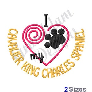 May include: Embroidered design featuring a pink heart with a paw print inside and the text "I love my Cavalier King Charles Spaniel" in a gold circle.