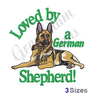 May include: Embroidered design featuring a German Shepherd dog lying down with the text "Loved by a German Shepherd!" in green lettering.