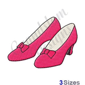 May include: A pair of pink high-heeled shoes with a bow on the toe.