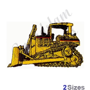 Op de afbeelding: Geborduurde afbeelding van een gele en zwarte bulldozer met een rode streep aan de zijkant. De bulldozer heeft een grote schop aan de voorkant en rupsbanden aan de onderkant.
