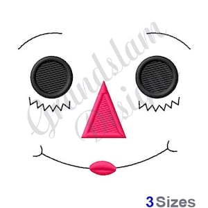 May include: Embroidered design of a cartoon face with black eyes, a pink triangle nose, and a pink smiling mouth.