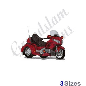 May include: A red motorcycle with a sidecar. The motorcycle has a windshield and a chrome exhaust pipe. The sidecar is black and has a white stripe.