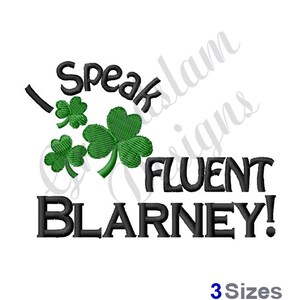 May include: Black and green embroidery design with shamrocks and the text "I Speak Fluent Blarney!"