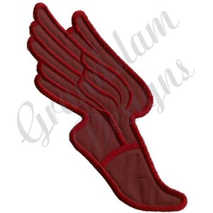 May include: A maroon-colored embroidered patch depicting a stylized running foot with wings. The foot is in a running position with the toes pointed forward and the heel raised. The wings are spread out behind the foot, giving the impression of speed and motion.