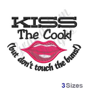 May include: Embroidered design with the text "Kiss the Cook! (but don't touch the buns)" and a red, pink, and white cartoon mouth.