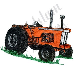 May include: An orange tractor with black wheels and a silver exhaust pipe. The tractor is on a green grassy hill.