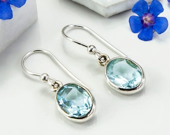 Sterling Silver Dangly Blue Topaz Oval Earrings