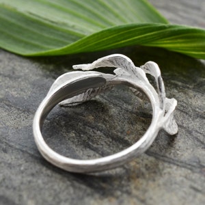 Laurel Leaves Ring Embracing Your Finger In 18k Gold