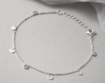 Pulsera con dije de moneda de plata esterlina