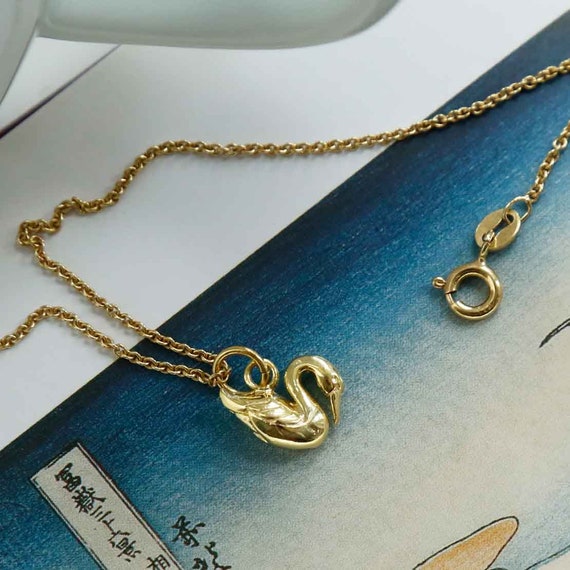 Gold swan necklace deals