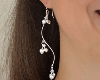 Pendientes colgantes de flamenco de plata de ley