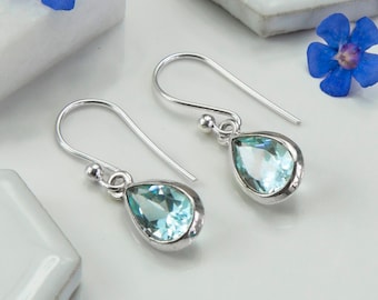 Sterling Silver Dangly Blue Topaz Teardrop Kolczyki