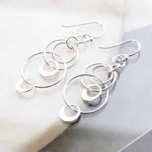 Sterling Silver Swinging Circles Dangly Earrings zdjęcie 1