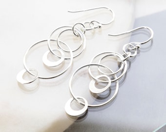 Sterling Silver Swinging Circles Dangly Earrings