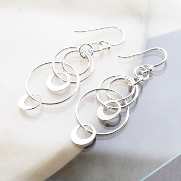 Sterling Silver Swinging Circles Dangly Earrings