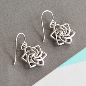 Sterling Silver Dangly Swirling Star Earrings