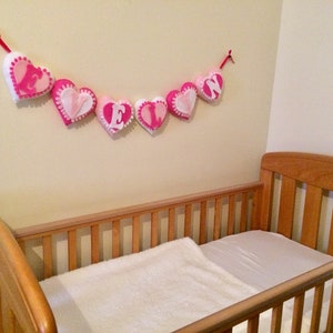 Personalised name felt heart banner with frills for baby nurseries and children&#39;s bedrooms