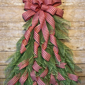 Best Seller Christmas Tree Door Hanger will look great on your door this holiday season. Made with Deco Mesh.