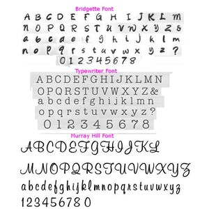 May include: A black and white typography chart displaying three distinct font styles labeled Bridgette, Typewriter, and Murray Hill. Each section includes uppercase letters, lowercase letters, numbers zero through eight, and an ampersand or question mark.