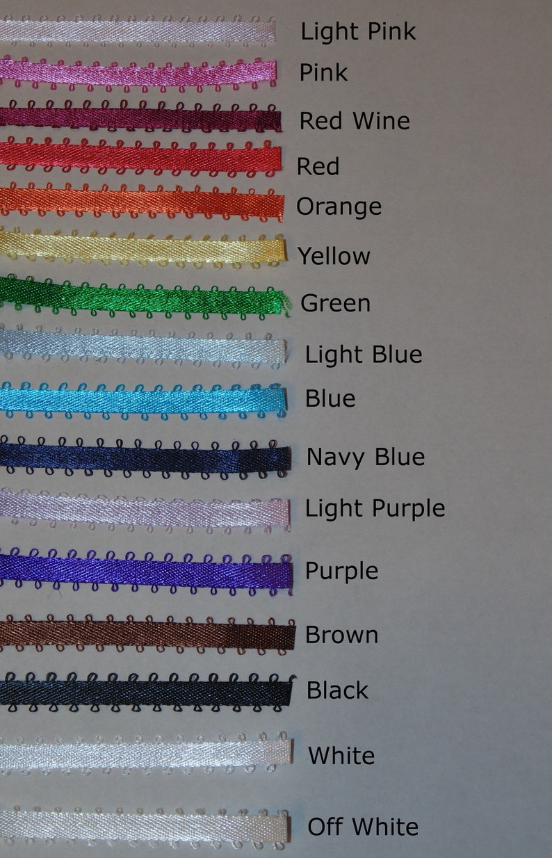May include: A collection of fifteen horizontal picot edge ribbons in various colors including light pink, pink, red wine, red, orange, yellow, green, light blue, blue, navy blue, light purple, purple, brown, black, white, and off-white.