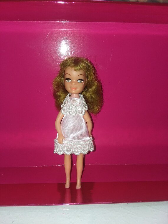 tiny teen doll