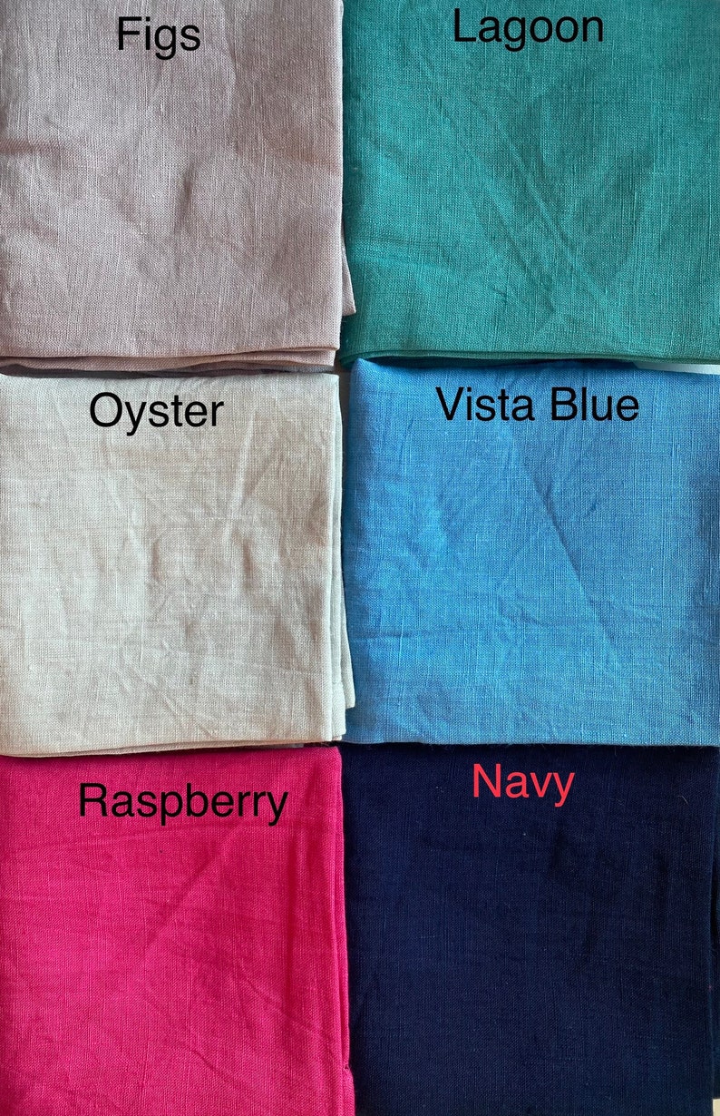 May include: A collection of six fabric swatches in various colors. The colors include "Figs", a light mauve; "Lagoon", a teal green; "Oyster", a light beige; "Vista Blue", a light blue; "Raspberry", a bright pink; and "Navy", a dark blue.