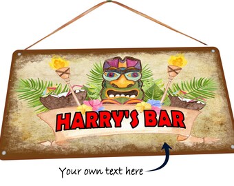 May include: A brown wooden sign with a tiki head, palm leaves, and coconuts. The sign says "HARRY'S BAR" in red letters.