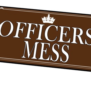 May include: A brown sign with white lettering and a white crown reads "OFFICERS' MESS".