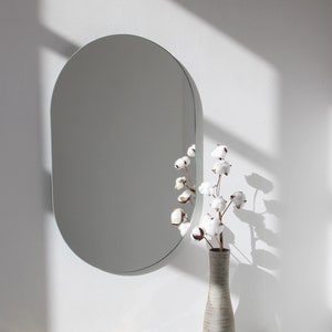 Capsula™ Capsule shaped Minimalist Frameless Mirror Floating Effect