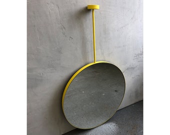 Orbis Suspended Hanging Round Mirror with a Modern Yellow Frame