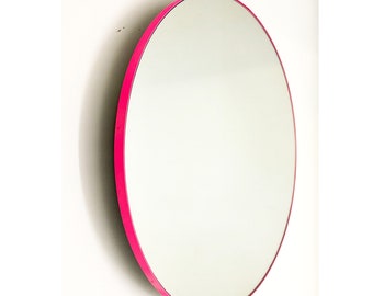 Orbis™ Round Minimalist Mirror with a Modern Pink Frame