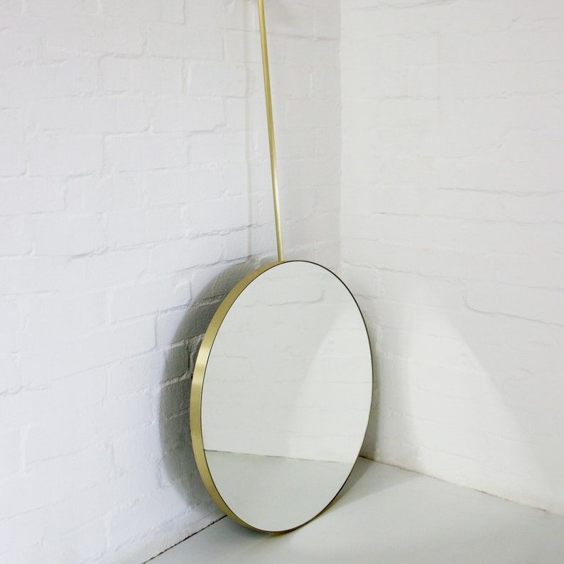 Round Ceiling Suspended Hanging Mirror with a Brushed Brass Frame