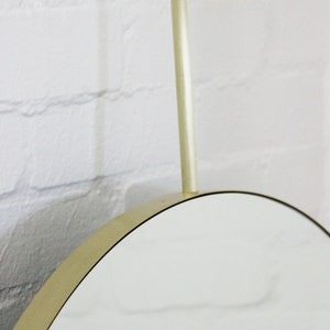 Orbis Round Ceiling Suspended Hanging Mirror with a Brushed Brass Frame image 4