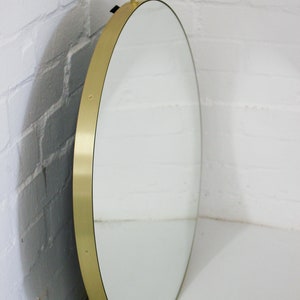 Orbis Round Ceiling Suspended Hanging Mirror with a Brushed Brass Frame image 6