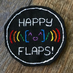 Autistic Pride Patch: Happy Flaps! with emoticon. Flapping, Stimming. Positivity. Made to order. Handsewn embroidery, stick on or sew on