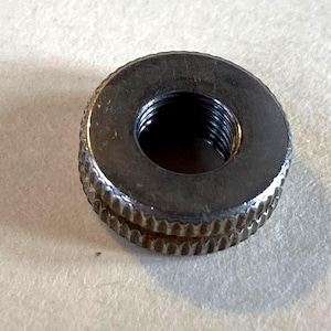 May include: A set of three ceramic mugs with a speckled, matte finish. The mugs are in shades of cream, light gray, and dark gray. Each mug has a simple, minimalist design, perfect for coffee or tea.