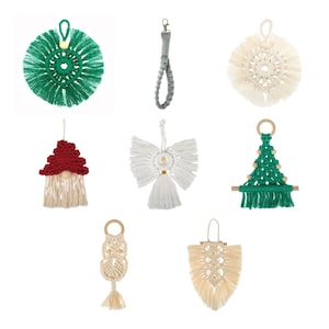 May include: Assortment of handmade macrame wall hangings in various shapes and colours, including a green wreath, a white angel, a red gnome, a green Christmas tree, and a white owl.