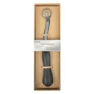 May include: A silver tracing wheel with a black wooden handle in a cardboard box. The box has the text "MILWARD" and "Tracing Wheel" printed on it.