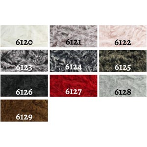 May include: A colour chart of nine different faux fur yarn colours. The colours are: white, light pink, grey, black, red, brown, dark grey, light grey, and green.