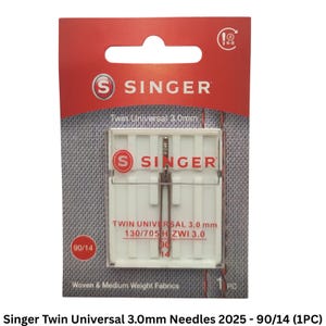 May include: A Singer twin universal sewing machine needle in a clear plastic case on a red and gray cardboard backing. The packaging displays the text Singer, Twin Universal 3.0 mm, 130/705 H ZWI 3.0, 90/14, and Woven & Medium Weight Fabrics.