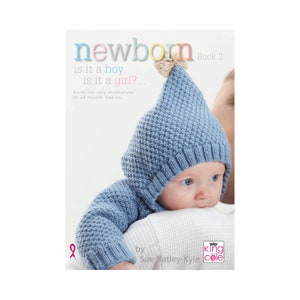 May include: A blue knitted hat and sweater set for a newborn baby. The book cover features the title "newborn Book 2 is it a boy, is it a girl? ... Knits for tiny premature to 24 month babies" and the author "by Sue Batley-Kyle".