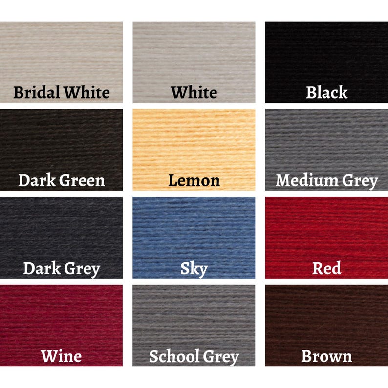 May include: A color chart featuring swatches of yarn in various shades. Colors include Bridal White, White, Black, Dark Green, Lemon, Medium Grey, Dark Grey, Sky, Red, Wine, School Grey, and Brown. Each swatch has the color name printed below.