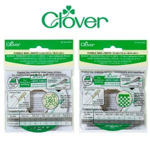 May include: Two packages of Clover fusible web tape for quilting and appliqué. One package is 5 mm wide (25 m/80 ft roll), and the other is 10 mm wide (12 m/40 ft roll). Both packages have instructions and diagrams.
